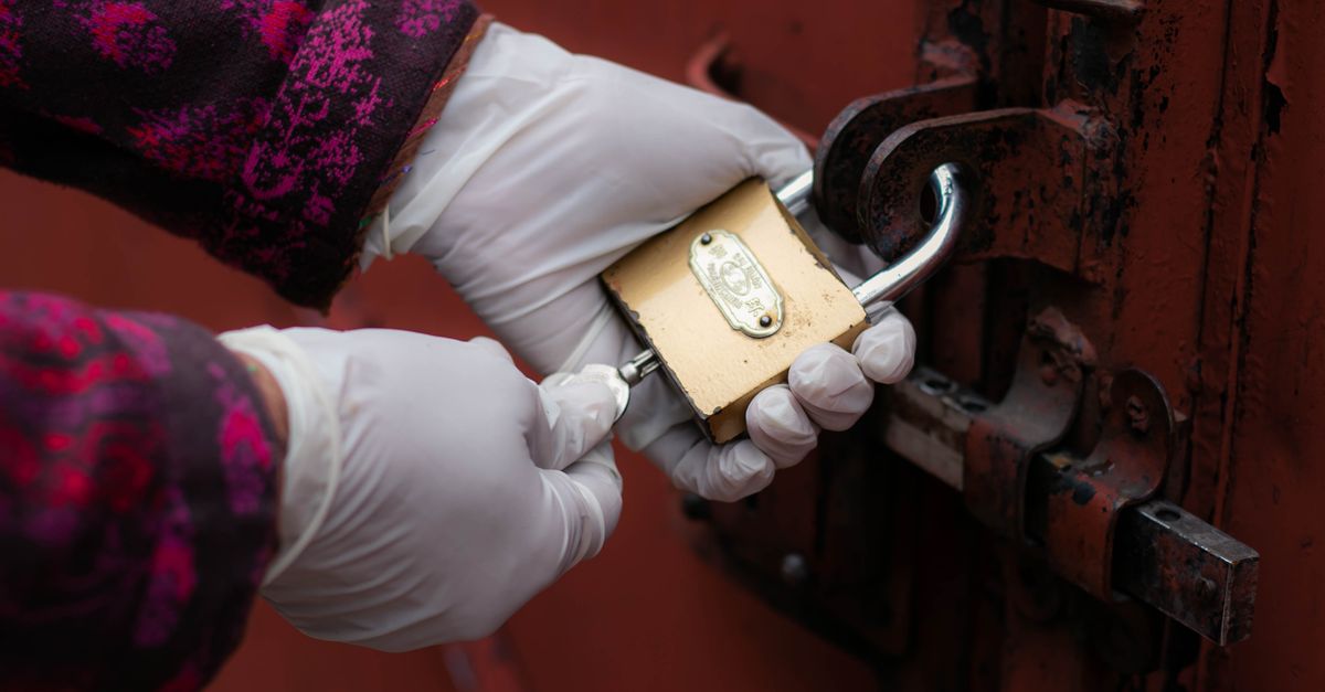 locksmith unlocking front door — Trusted Key Locksmith